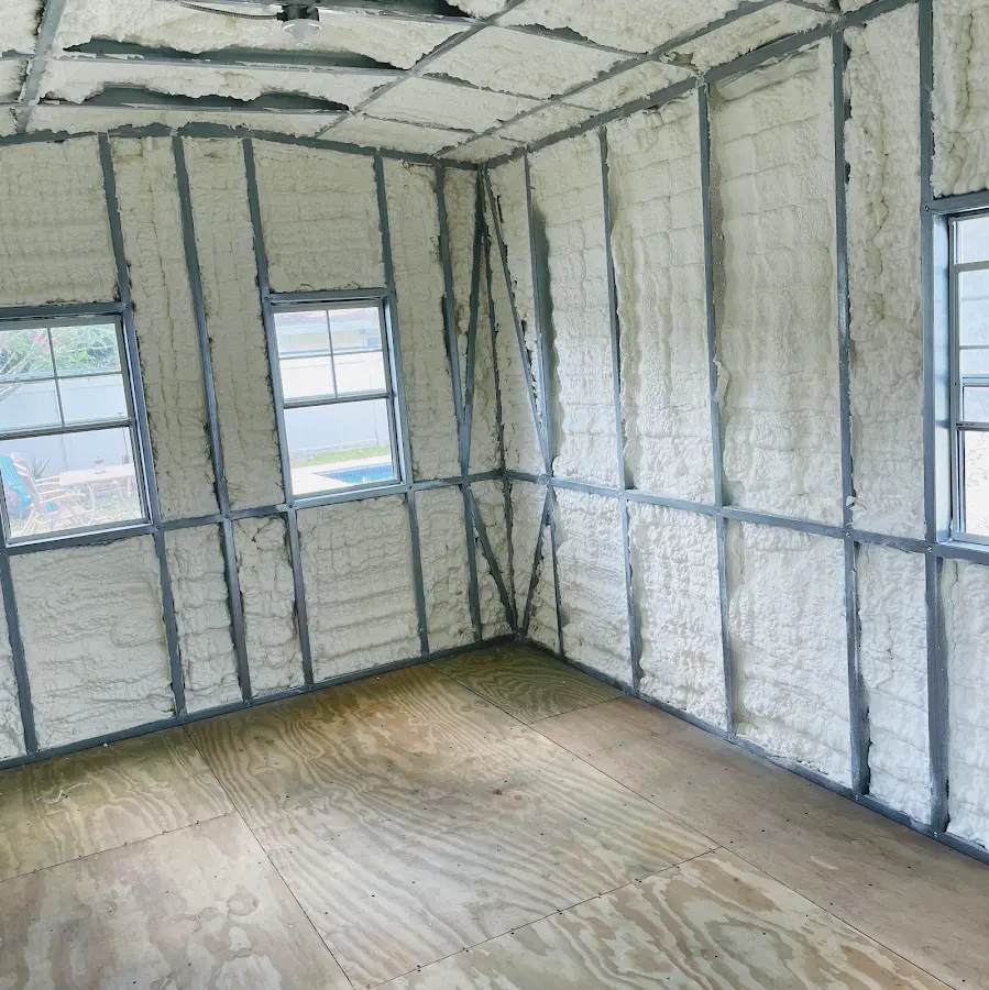 Closed-cell spray foam insulation applied to wall cavities in a residential project in Taunton